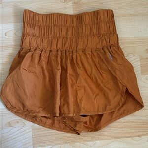 Free People Movement Shorts in Rust Orange